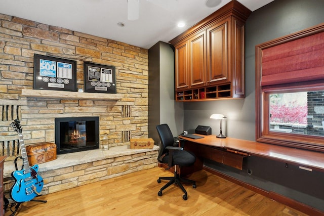 1424 Glencoe Ave, Highland Park, IL 60035 - home office featuring wood finished floors, built in study area, and a stone fireplace