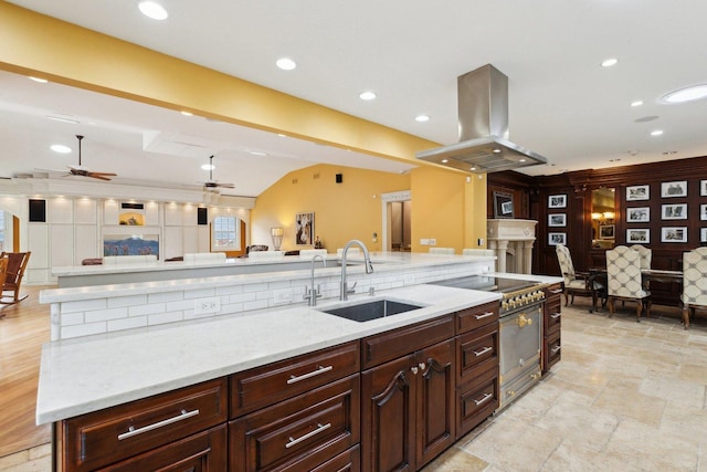 1424 Glencoe Ave, Highland Park, IL 60035 - kitchen featuring a sink, island exhaust hood, open floor plan, ceiling fan, and black electric cooktop