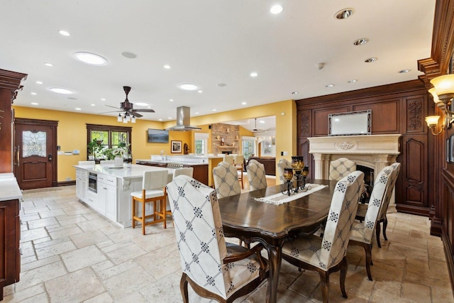 1424 Glencoe Ave, Highland Park, IL 60035 - dining area with stone tile floors, recessed lighting, a ceiling fan, and baseboards