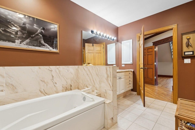1424 Glencoe Ave, Highland Park, IL 60035 - bathroom with a bath, vanity, and tile patterned floors