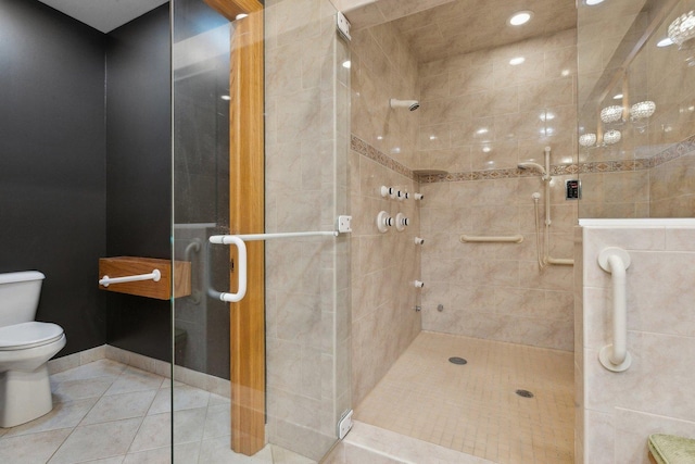 1424 Glencoe Ave, Highland Park, IL 60035 - bathroom with a shower stall, toilet, and tile patterned floors