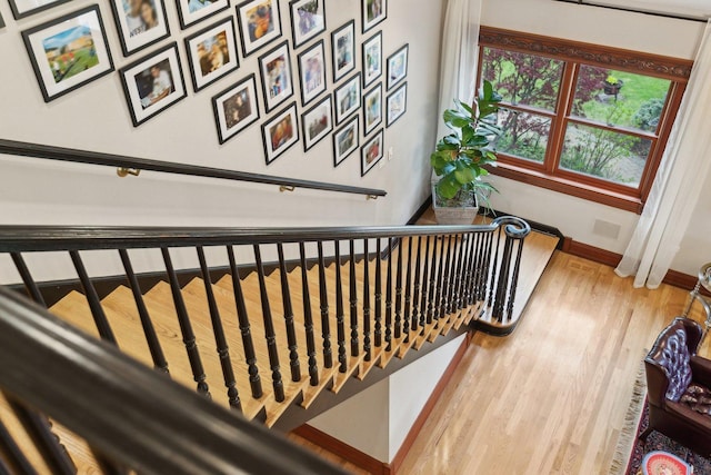 1424 Glencoe Ave, Highland Park, IL 60035 - staircase with baseboards and wood finished floors