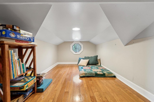 1424 Glencoe Ave, Highland Park, IL 60035 - bedroom featuring wood finished floors, lofted ceiling, and baseboards
