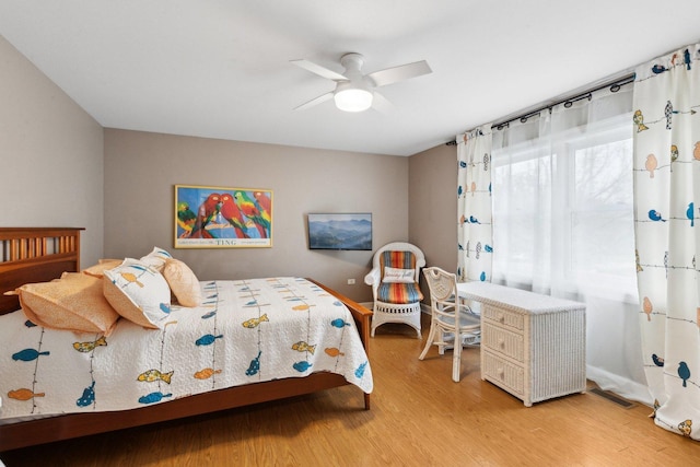 1424 Glencoe Ave, Highland Park, IL 60035 - bedroom featuring light wood-style flooring and ceiling fan