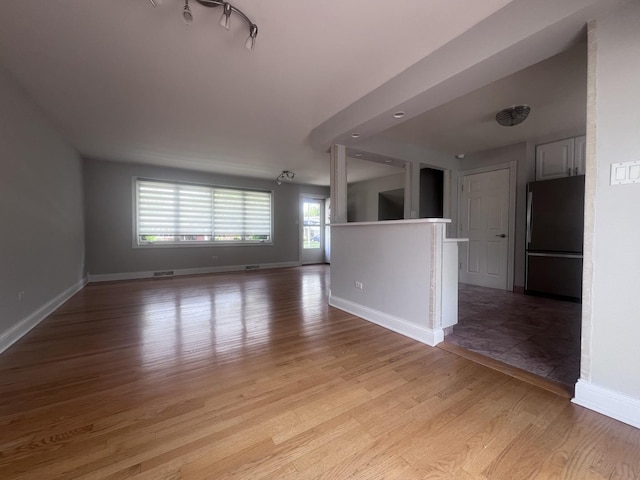 7011 Avon Ave, Oak Lawn, IL 60453 - spare room with light wood-type flooring and baseboards