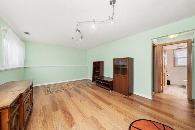 7011 Avon Ave, Oak Lawn, IL 60453 - interior space with light wood-style flooring and baseboards