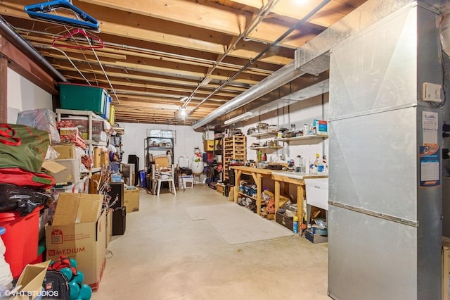 1021 Oxford St, Downers Grove, IL 60516 - unfinished below grade area with heating unit and a workshop area