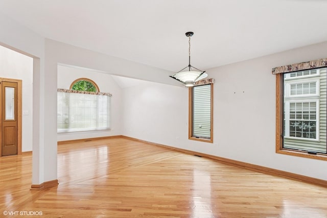 1021 Oxford St, Downers Grove, IL 60516 - empty room featuring light wood finished floors and lofted ceiling