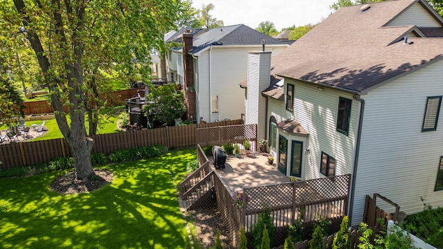 1021 Oxford St, Downers Grove, IL 60516 - rear view of house featuring roof with shingles, a fenced backyard, and a patio