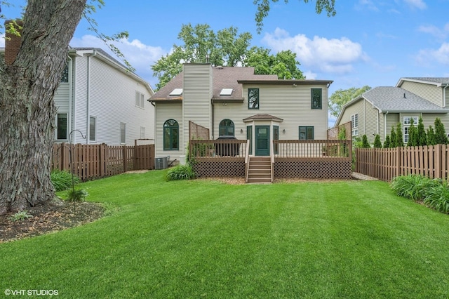 1021 Oxford St, Downers Grove, IL 60516 - back of property featuring a wooden deck, a fenced backyard, a chimney, and a shingled roof