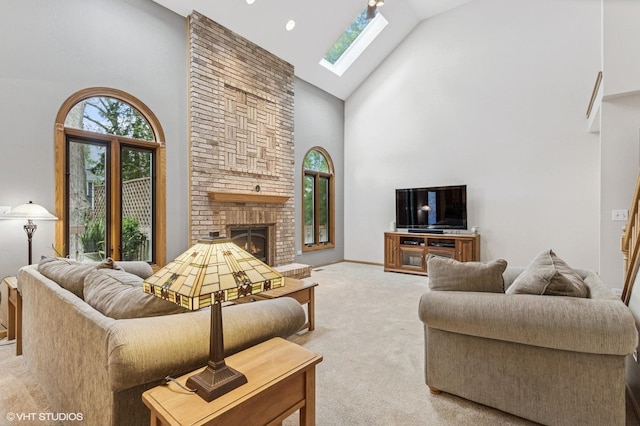 1021 Oxford St, Downers Grove, IL 60516 - living area featuring high vaulted ceiling, light carpet, plenty of natural light, a skylight, and a brick fireplace