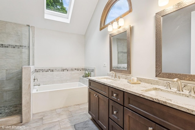 1021 Oxford St, Downers Grove, IL 60516 - bathroom featuring a garden tub, double vanity, a skylight, lofted ceiling, and tiled shower