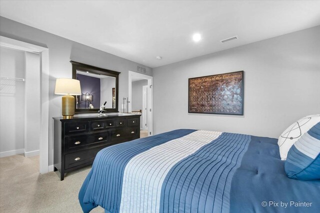 2093 Squire Cir, Yorkville, IL 60560 - bedroom with light carpet and baseboards