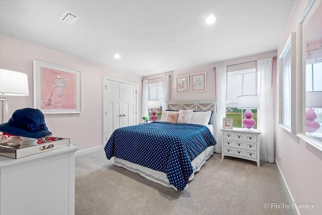 2093 Squire Cir, Yorkville, IL 60560 - carpeted bedroom with multiple windows, baseboards, and recessed lighting