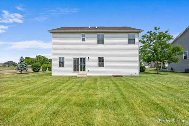 2093 Squire Cir, Yorkville, IL 60560 - rear view of property featuring a lawn and cooling unit