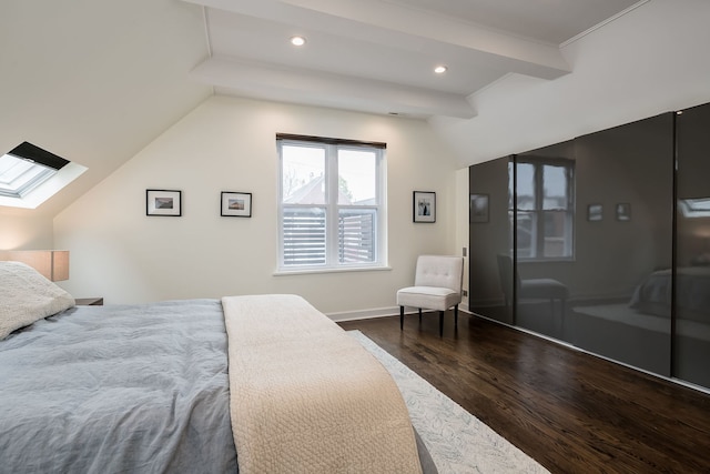 2117 W Dickens Ave, Chicago, IL 60647 - bedroom featuring dark wood finished floors, a skylight, lofted ceiling, recessed lighting, and baseboards