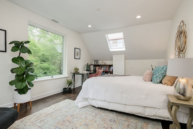 2117 W Dickens Ave, Chicago, IL 60647 - bedroom featuring a skylight, multiple windows, wood finished floors, lofted ceiling, and recessed lighting