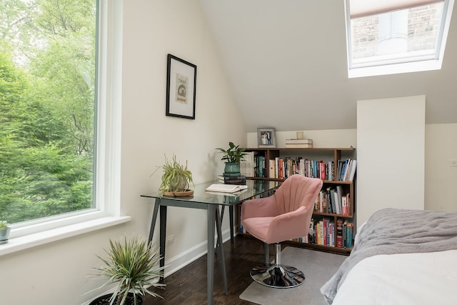 2117 W Dickens Ave, Chicago, IL 60647 - bedroom featuring wood finished floors, multiple windows, vaulted ceiling, and baseboards