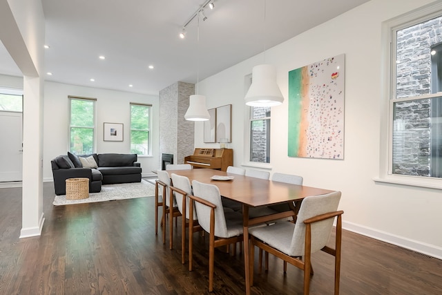 2117 W Dickens Ave, Chicago, IL 60647 - dining area with dark wood-style flooring, rail lighting, baseboards, and recessed lighting