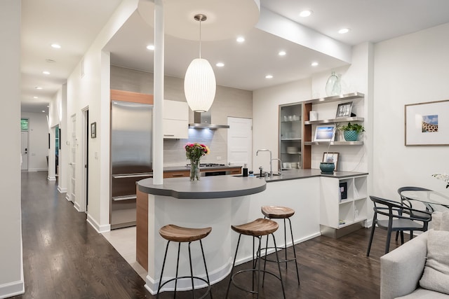 2117 W Dickens Ave, Chicago, IL 60647 - kitchen with built in fridge, open shelves, dark wood finished floors, modern cabinets, and recessed lighting