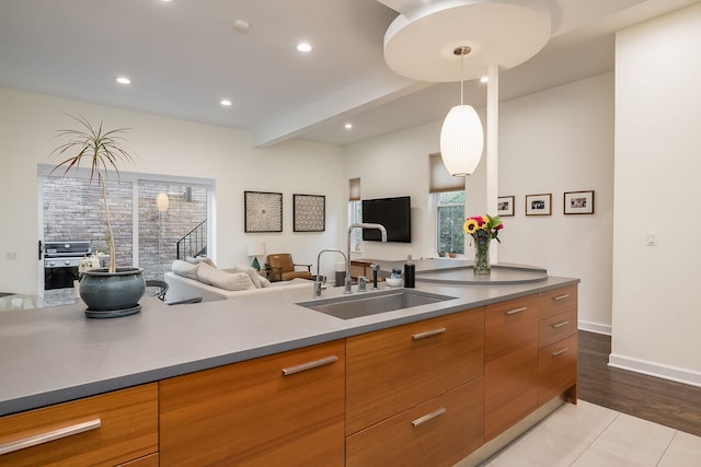 2117 W Dickens Ave, Chicago, IL 60647 - kitchen featuring open floor plan, a sink, hanging light fixtures, recessed lighting, and modern cabinets
