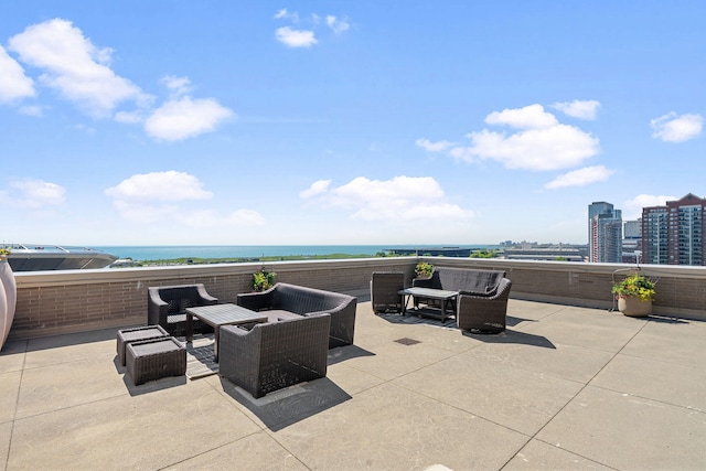 1515 S Prairie Ave Unit 1016, Chicago, IL 60605 - view of patio featuring an outdoor hangout area and a water view