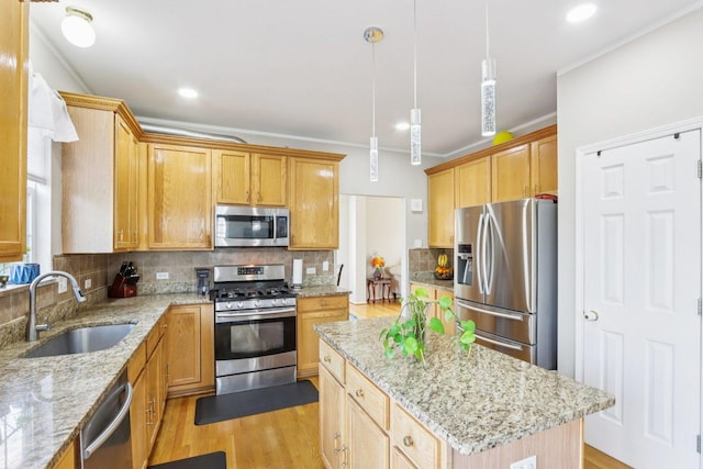263 Thrush Cir, Lindenhurst, IL 60046 - kitchen featuring stainless steel appliances, a sink, a center island, ornamental molding, and tasteful backsplash