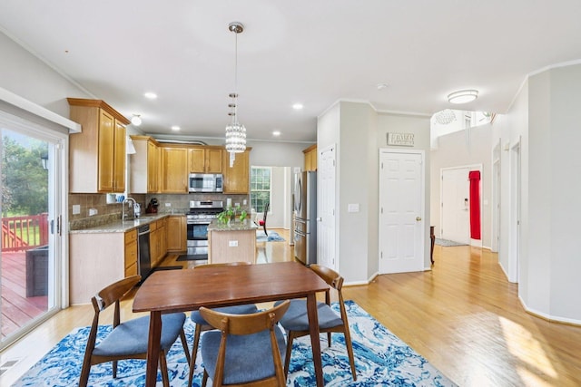 263 Thrush Cir, Lindenhurst, IL 60046 - dining room featuring light wood-style flooring, crown molding, baseboards, and recessed lighting