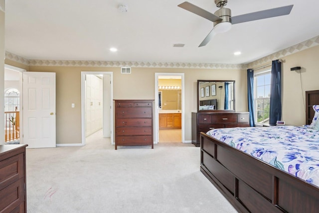 263 Thrush Cir, Lindenhurst, IL 60046 - bedroom with connected bathroom, light colored carpet, baseboards, and a ceiling fan