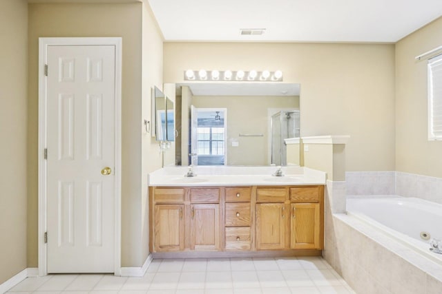 263 Thrush Cir, Lindenhurst, IL 60046 - full bathroom with a jetted tub, a shower stall, double vanity, and tile patterned flooring