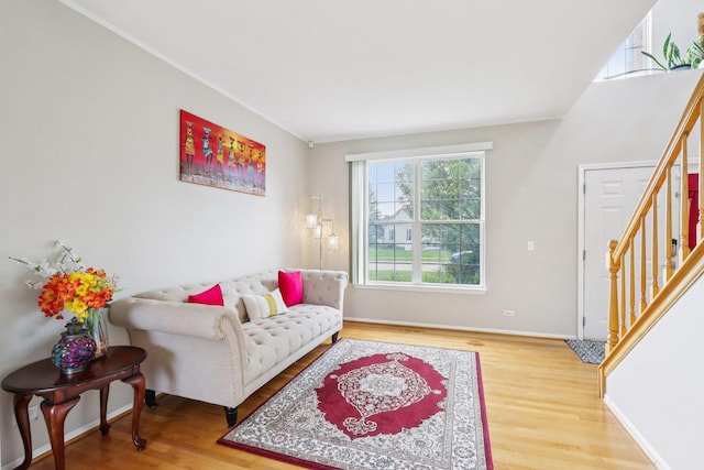 263 Thrush Cir, Lindenhurst, IL 60046 - living area featuring wood finished floors, stairs, and baseboards