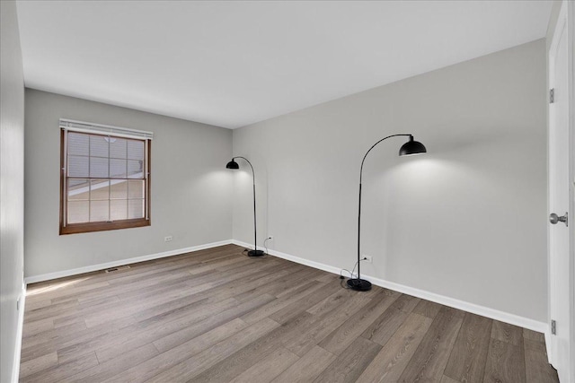 1330 Woodcutter Ln, Wheaton, IL 60189 - unfurnished room with wood finished floors and baseboards
