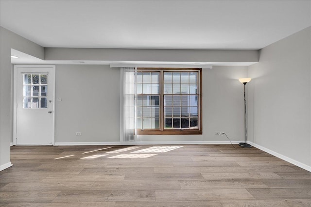 1330 Woodcutter Ln, Wheaton, IL 60189 - unfurnished room with wood finished floors and baseboards
