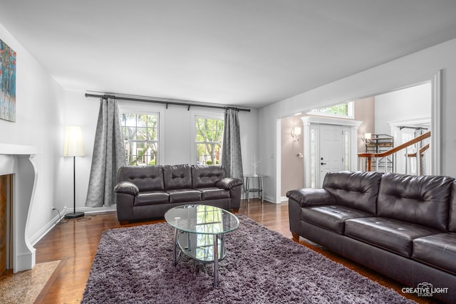 2417 Wentworth Ln, Aurora, IL 60502 - living room featuring baseboards and wood finished floors