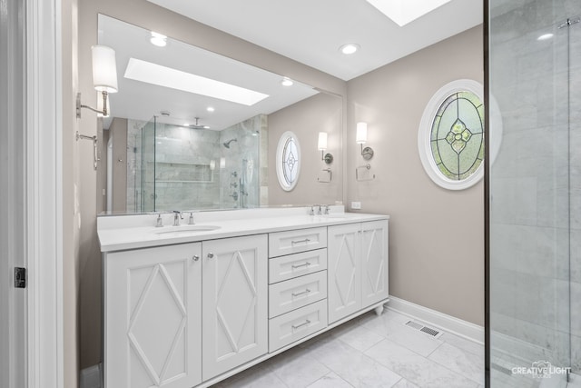 2417 Wentworth Ln, Aurora, IL 60502 - full bathroom with a skylight, a shower stall, double vanity, baseboards, and recessed lighting