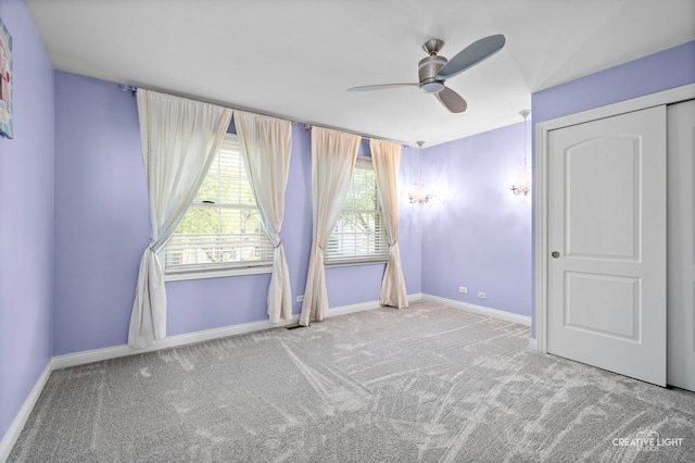 2417 Wentworth Ln, Aurora, IL 60502 - unfurnished bedroom with carpet flooring, baseboards, and ceiling fan