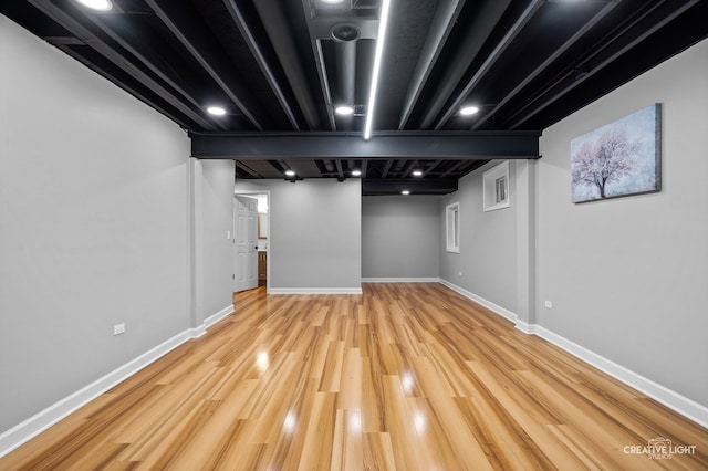 2417 Wentworth Ln, Aurora, IL 60502 - basement with baseboards and wood finished floors