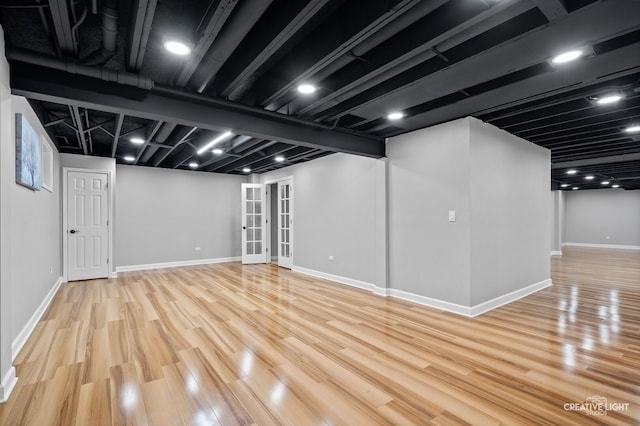 2417 Wentworth Ln, Aurora, IL 60502 - finished below grade area with wood finished floors and baseboards
