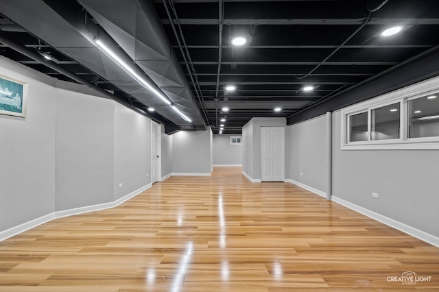 2417 Wentworth Ln, Aurora, IL 60502 - finished below grade area featuring baseboards and light wood finished floors