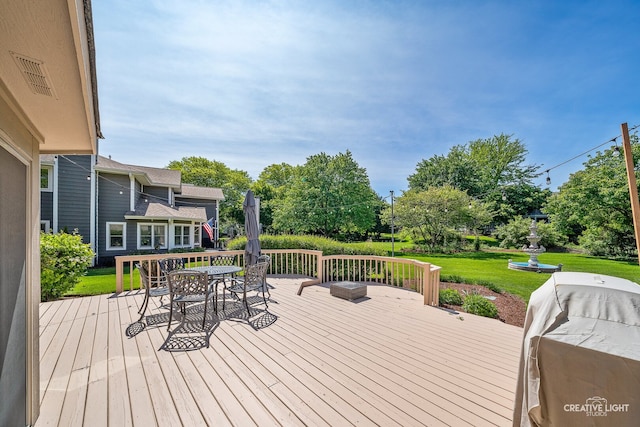 2417 Wentworth Ln, Aurora, IL 60502 - wooden terrace with outdoor dining area and a yard