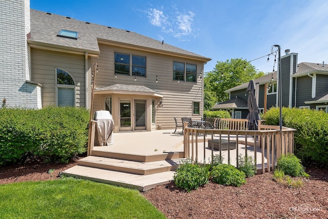 2417 Wentworth Ln, Aurora, IL 60502 - back of house with a deck and a shingled roof