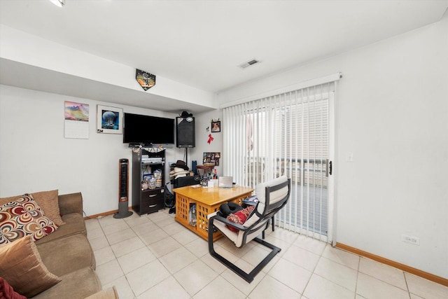 46 Harmony Ln, Romeoville, IL 60446 - living area featuring baseboards and light tile patterned flooring