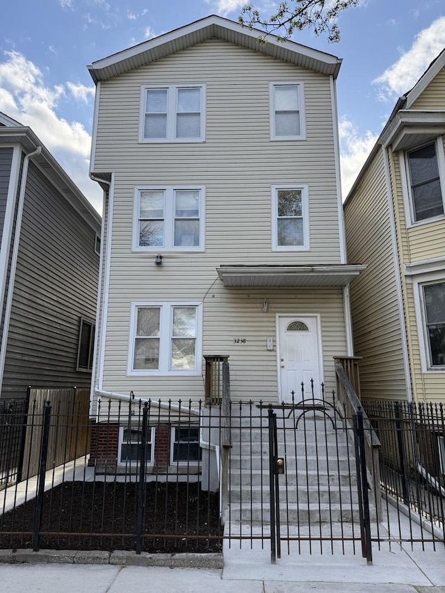 3238 N Whipple St, Chicago, IL 60618 - view of front of property with a fenced front yard