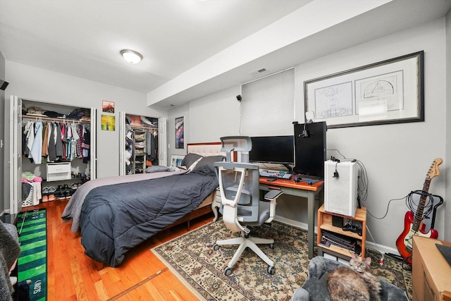3238 N Whipple St, Chicago, IL 60618 - bedroom with wood finished floors and a desk
