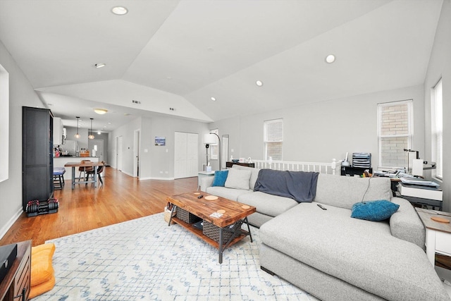 3238 N Whipple St, Chicago, IL 60618 - living area featuring lofted ceiling, light wood-style flooring, baseboards, and recessed lighting