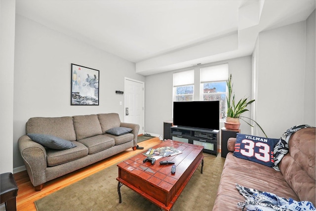 3238 N Whipple St, Chicago, IL 60618 - living area featuring light wood-style floors and baseboards