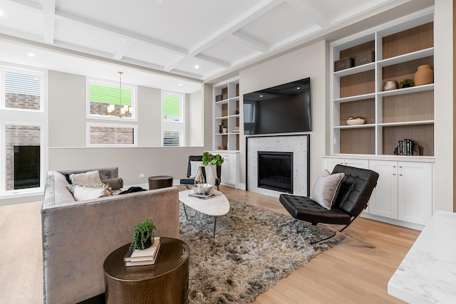 1636 W Wolfram St, Chicago, IL 60657 - living area featuring a fireplace, light wood-type flooring, coffered ceiling, built in features, and beam ceiling
