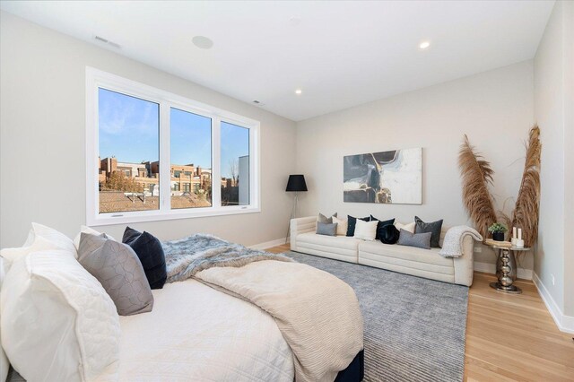 1636 W Wolfram St, Chicago, IL 60657 - bedroom featuring light wood-style floors, baseboards, and recessed lighting