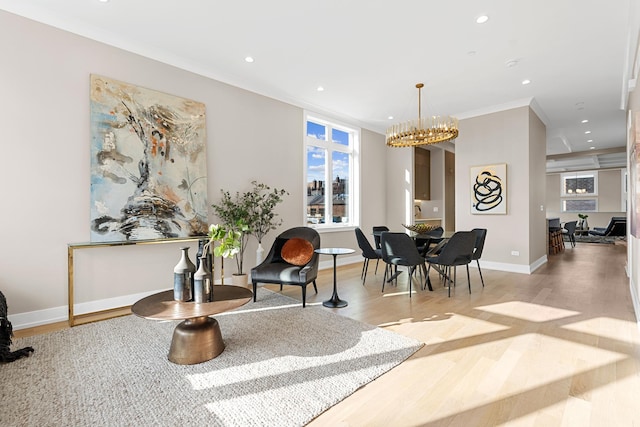 1636 W Wolfram St, Chicago, IL 60657 - dining space featuring healthy amount of natural light, light wood finished floors, ornamental molding, a chandelier, and recessed lighting
