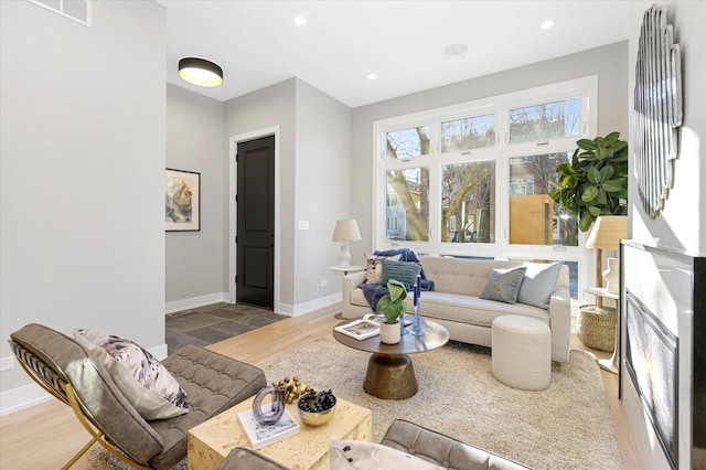 1636 W Wolfram St, Chicago, IL 60657 - living area featuring wood finished floors, baseboards, and recessed lighting